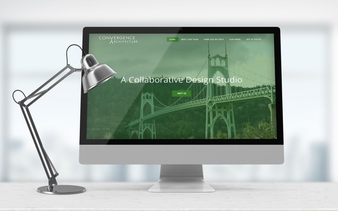 Convergence Architecture Website on Desk
